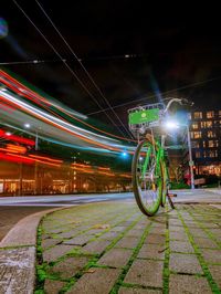 Light trails on street in city at night