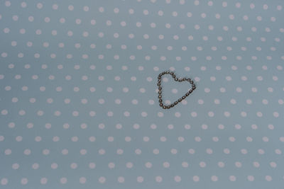 Close-up of heart shape on metal