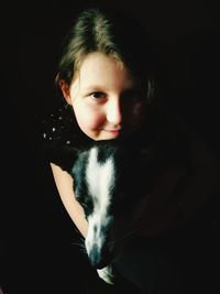 Portrait of cute girl with dog