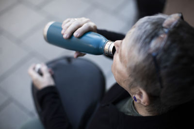 Thirsty woman drinking water