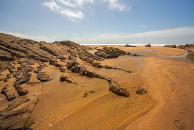 Scenic view of desert against sky