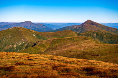 Scenic view of mountains against sky