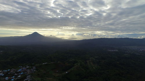 Scenic view of landscape against sky during sunset