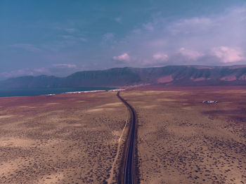 Scenic view of desert against sky