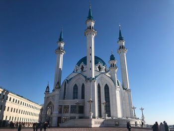 Low angle view of cathedral against clear blue sky