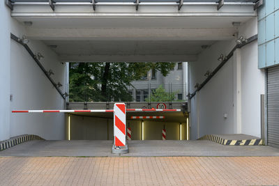 Empty road amidst buildings