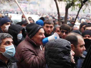 Group of people on street in city