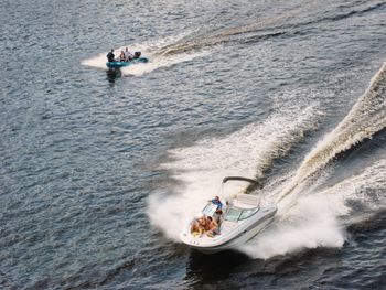 High angle view of people on boat in sea