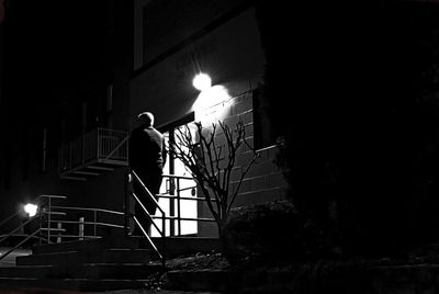 Silhouette of woman at night