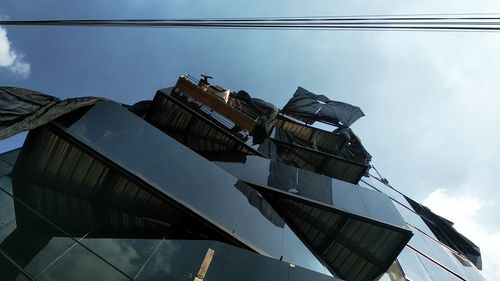 Low angle view of buildings in city against sky