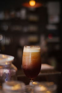 Close-up of wine glass on table