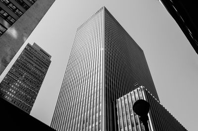 Low angle view of modern buildings against clear sky