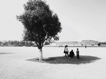 People relaxing in park