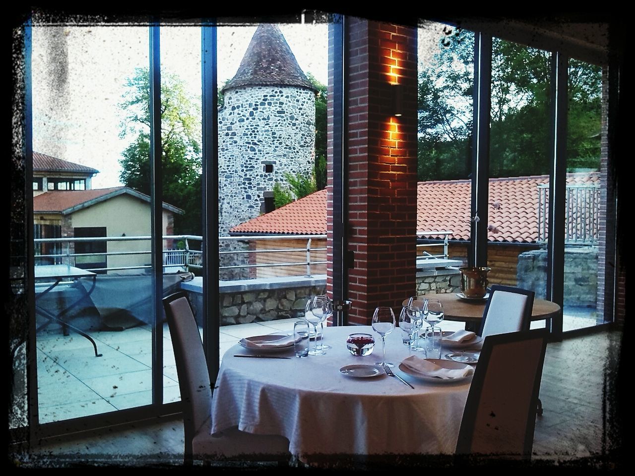 window, table, indoors, chair, no people, absence, place setting, empty, day, plate, home interior, water, drinking glass, architecture