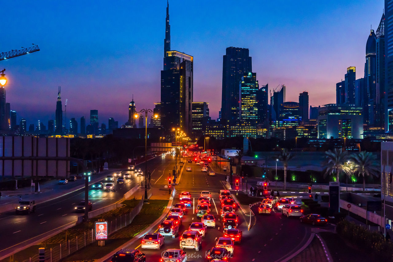 HIGH ANGLE VIEW OF TRAFFIC ON ROAD