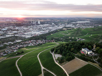 High angle view of buildings against sky during sunset