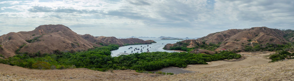 Panoramic view of landscape and mountains against sky