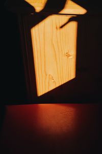 Close-up of illuminated lamp at home
