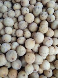 Full frame shot of onions for sale at market stall