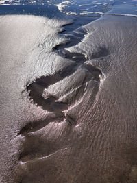 High angle view of shadow on beach