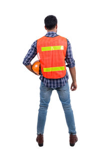 Rear view of man standing against white background