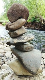 Close-up of stone stack on rock