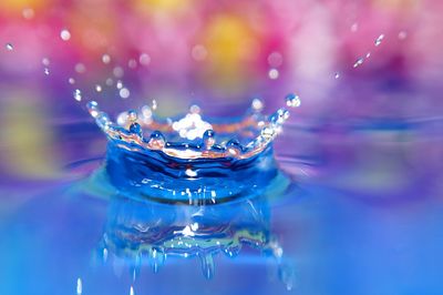 Close-up of water splashing on black background