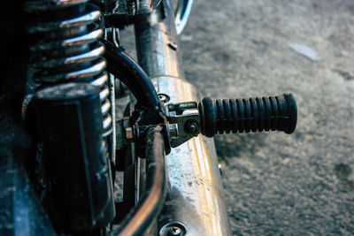 Close-up of bicycle parked on road