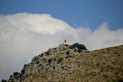 Scenic view of rock against sky