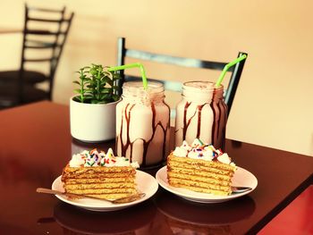 Close-up of dessert and drinks on table