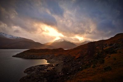 Scenic view of mountains at sunset