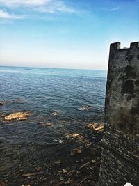 Scenic view of sea against clear blue sky