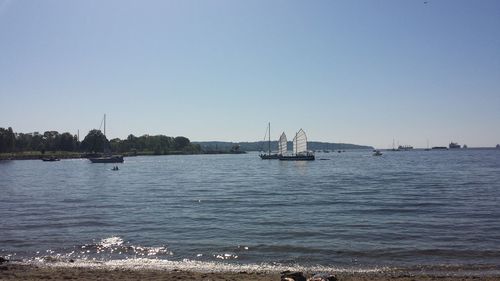 Boats sailing in sea