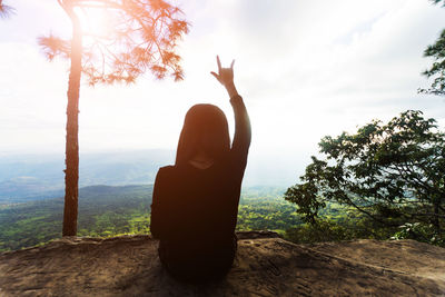 Rear view of woman on mountain