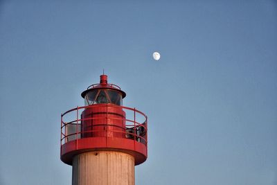 Low angle view of tower against sky at night