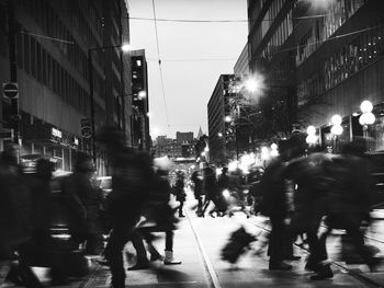 Blurred motion of people crossing street