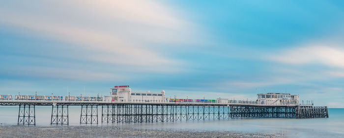 Pier over sea against sky