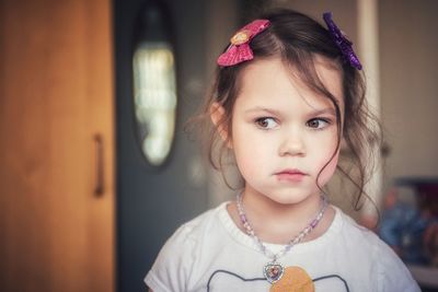 Portrait of cute girl at home