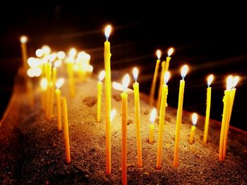 Close-up of illuminated candles