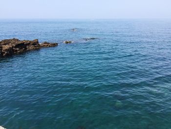 Scenic view of sea against clear sky