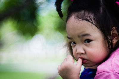 Close-up portrait of cute girl