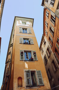 Low angle view of residential building against sky