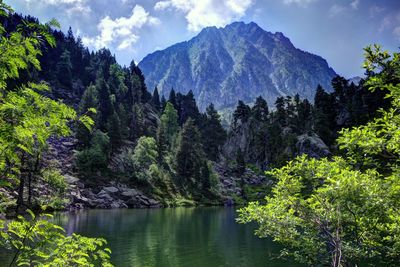 Lake in front of a mountain in lleida. aiguestortes natural park 