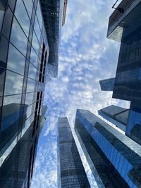 Low angle view of modern buildings against sky