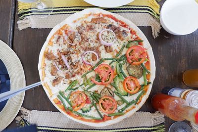 High angle view of pizza on table