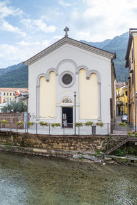 The historic center of omegna with beautiful buildings near the river