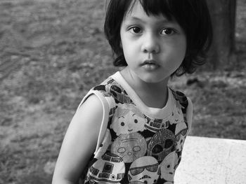 Close-up portrait of girl at park