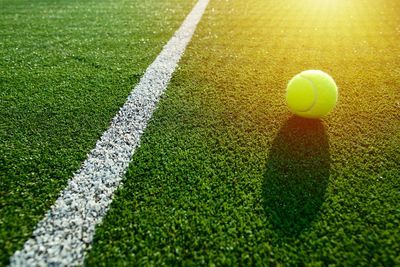 Close-up of yellow ball on field