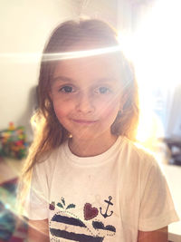 Portrait of smiling girl at home