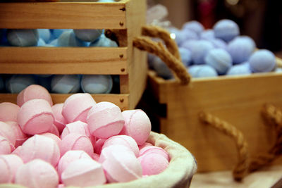 Soap in different colors in baskets.